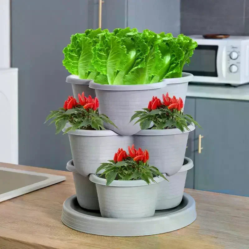 jardinière verticale empilable moderne pots intégrés fraises herbes aromatiques fleurs gris orange vert