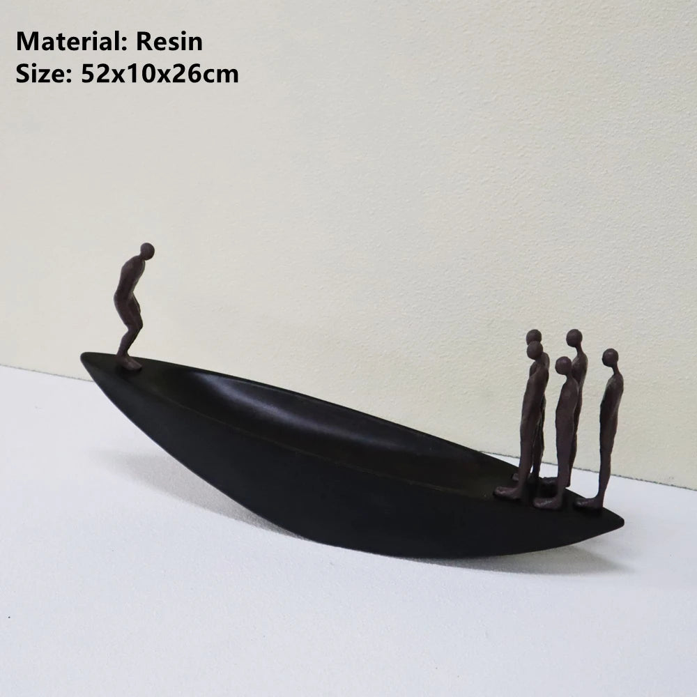 sculpture décorative résine marron foncé embarcation figurines humaines contemporaine abstraite