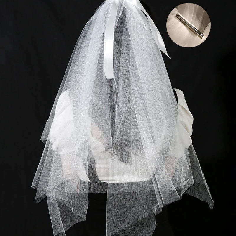 voile mariée tulle plissé blanc classique romantique fixé noeud transparent élégant