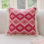 coussin deco boho chic rose blanc motif geometrique franges opaques canape lit decoration intérieure