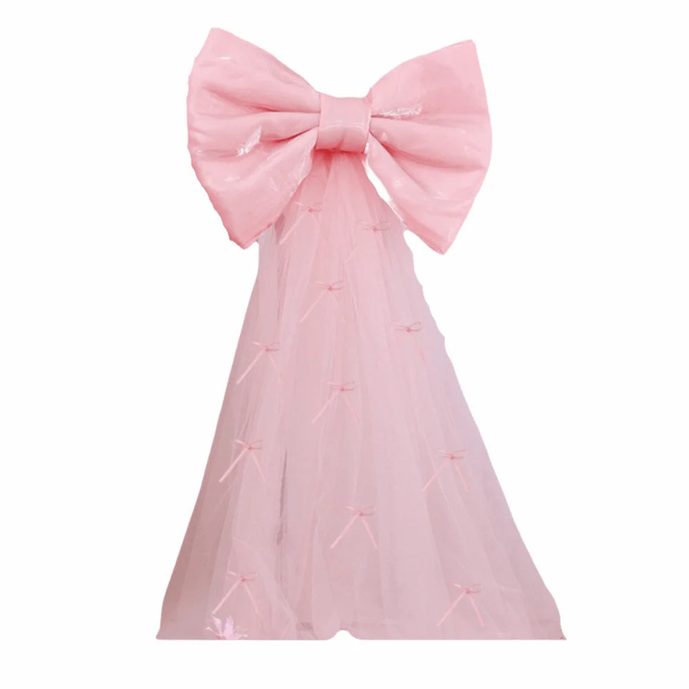 ruban decoratif forme noeud sequins dorés argentés rose rouge nouvelle année fête grande dimension