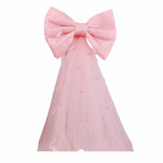 ruban decoratif forme noeud sequins dorés argentés rose rouge nouvelle année fête grande dimension
