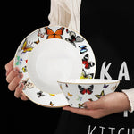 tasse assiette soucoupe motif papillons colorés os chinois élégante décoration thé blanc