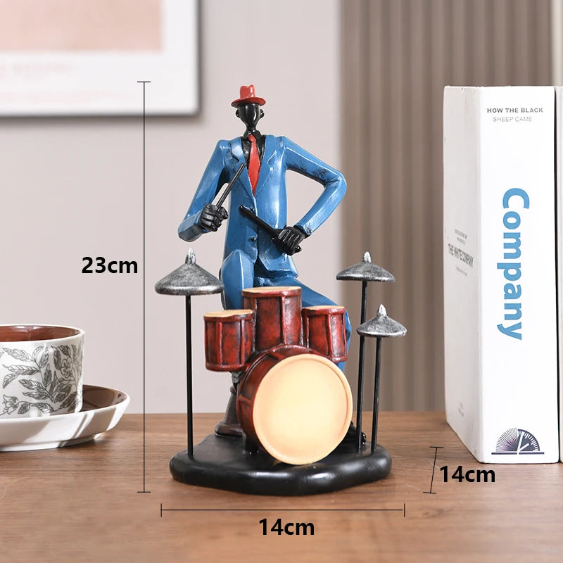 statues miniatures musiciens guitare saxophone trombone batterie décoration intérieure moderne stylisée