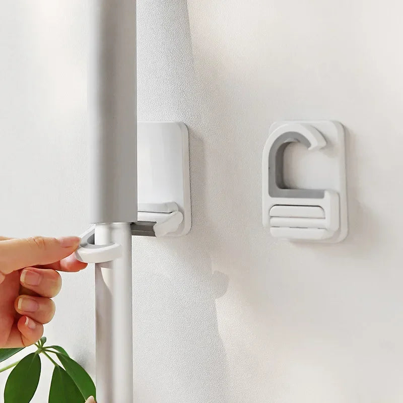 organisateur mural adhésif balai serpillière brosses rangement cuisine salle bain support plastique minimaliste moderne