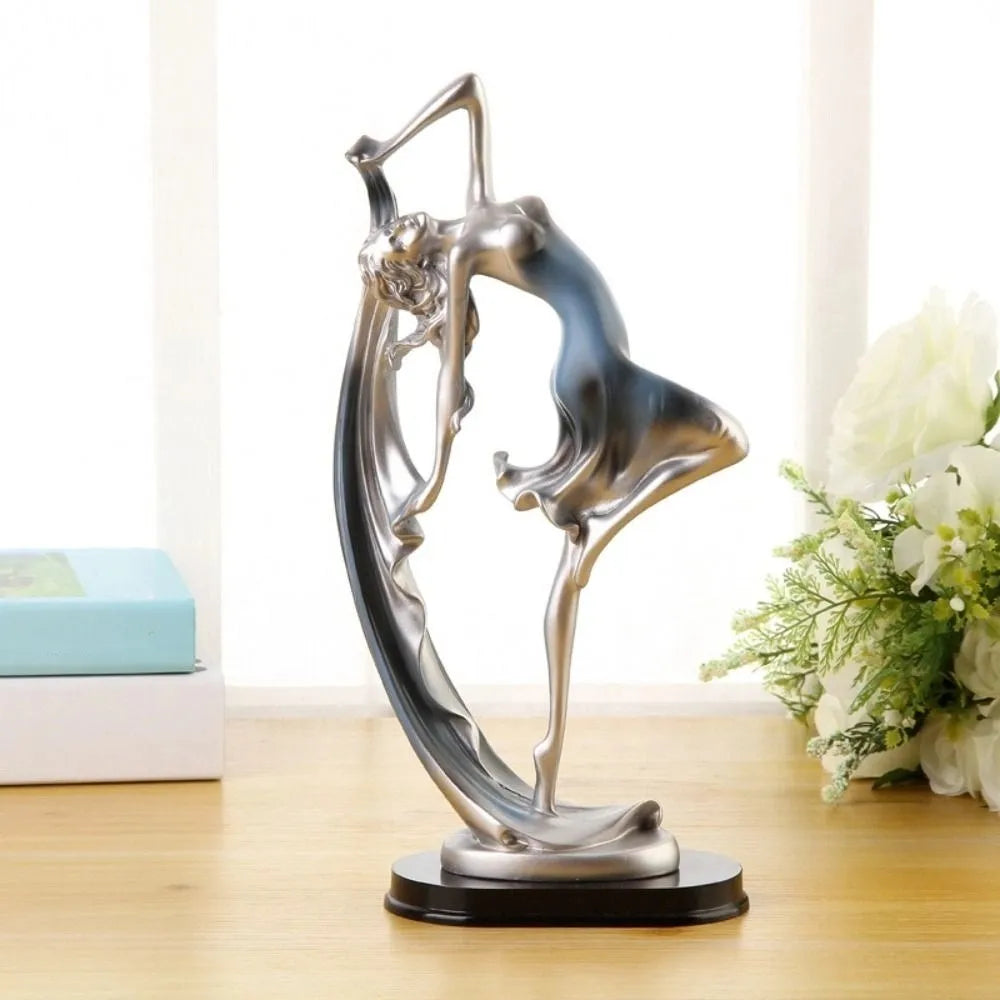statue moderne femme mouvement argenté doré bleu lisse brillante base noire abstraite