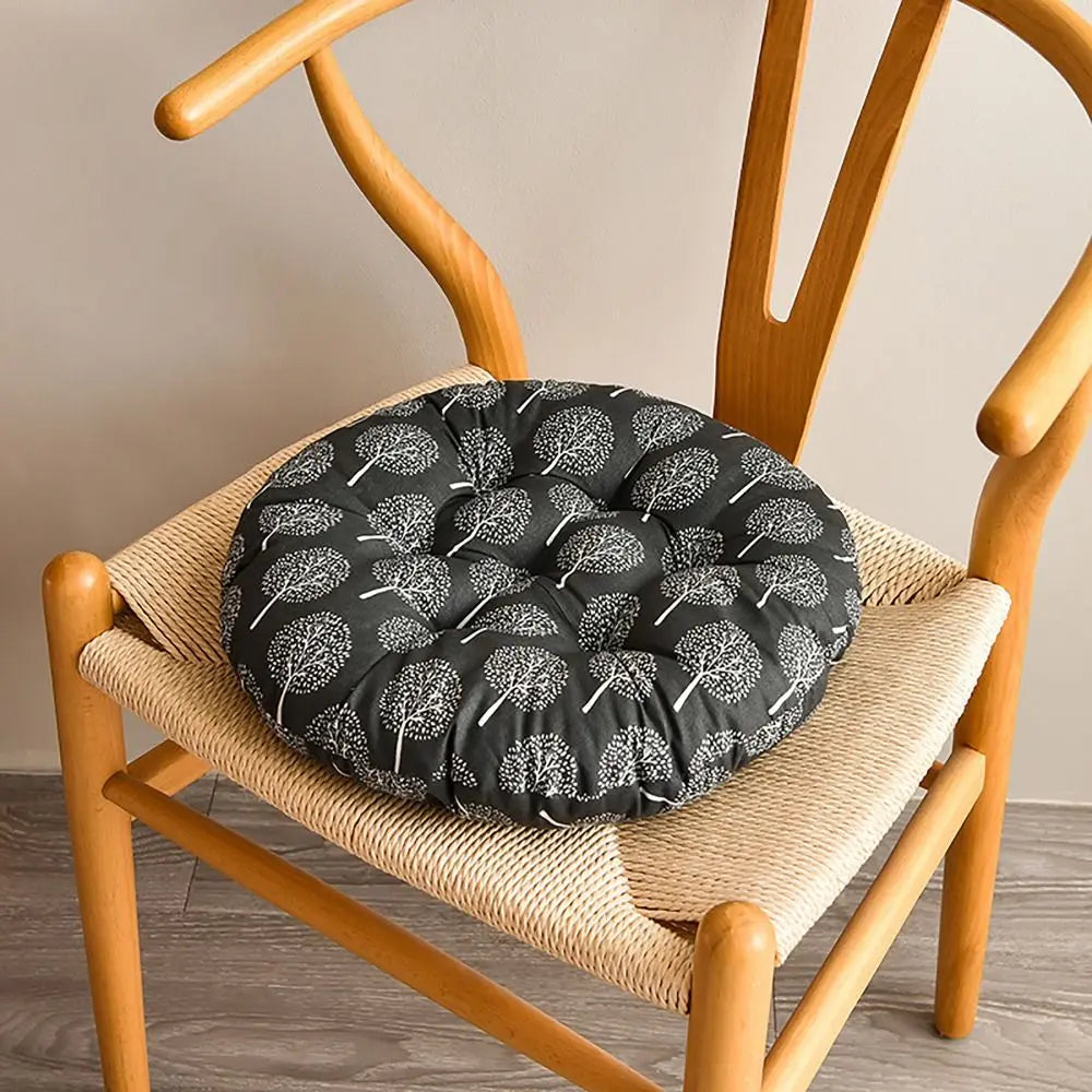 coussin chaise rond moderne couleurs bleu marine blanc vert beige noir motifs géométriques feuilles