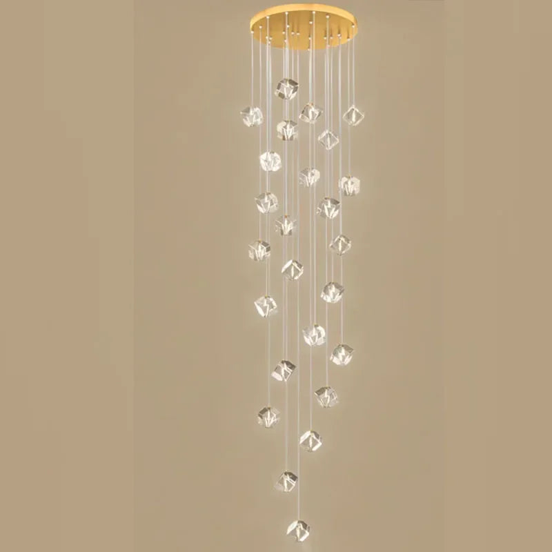 suspension lumineuse moderne transparente dorée facettes géométriques élégantes multiples lampes
