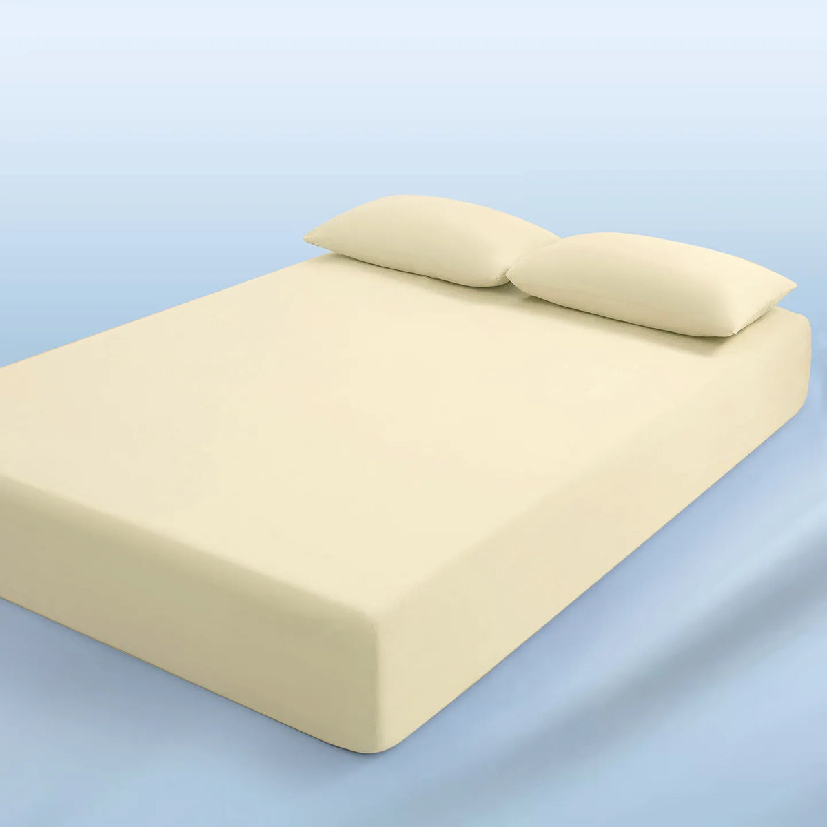 parure lit bleu clair drap housse élastique deux oreillers coton doux chambre moderne
