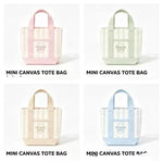 sac main toile rayé rose clair vert pastel beige bleu violet poignées détachables moderne