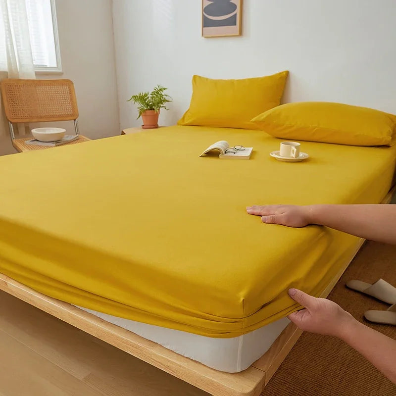Drap-housse en couleur bourgogne sur matelas