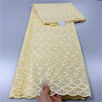 tissu dentelle coton blanc motifs floraux broderie strass robe couture luxe