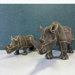 statuette rhinocéros marron foncé texture granuleuse décoratif animalier doré grande petite