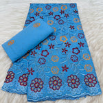 tissu dentelle coton brodé fleurs motif broderie africaine voile suisse vêtement élégant