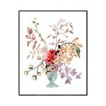 Bouquet de fleurs automnales colorées dans un vase en céramique.