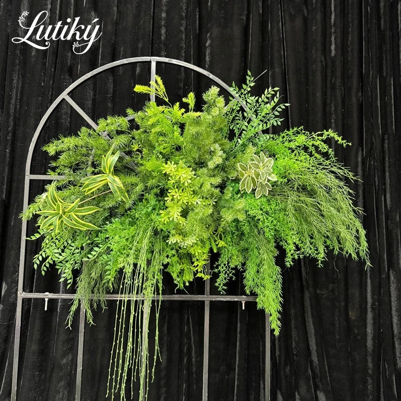 décoration extérieure arche verte feuillage dense naturelle rustique événements anniversaires fêtes mariage