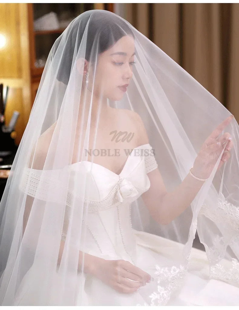 voile mariage dentelle blanc élégant fixation dentelle blanche cathédrale femme adultère monotrice opacité