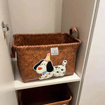 panier rangement rotin tissé marron clair brodé chien rustique poignées cuir décoration maison