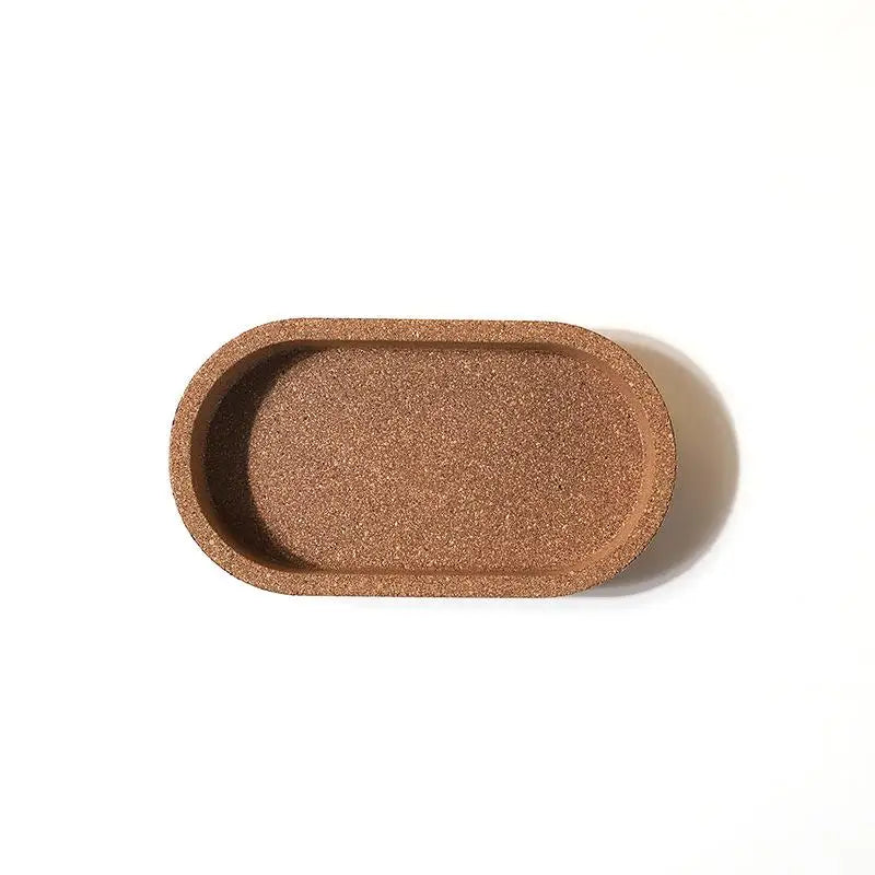 plateau ovale liège marron texture naturelle moderne organisation salle bain ustensiles bijoux