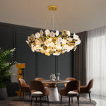 Suspension lumineuse contemporaine dorée fleurs stylisées salon chambre d'hôtel led sources lumière