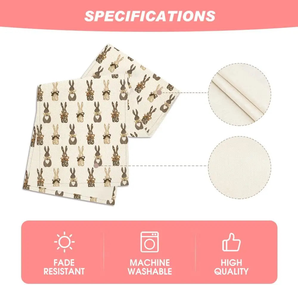 Une image montrant des serviettes en tissu imprimées de motifs de lapins, indiquant leur résistance à la décoloration, leur lavage en machine et leur haute qualité.