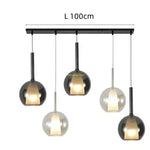 suspension lumineuse moderne argentée brillante câble suspendu diffuseur sphérique translucent 20cm 25cm 15cm