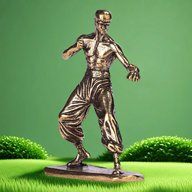 statue art martial homme dynamique doré végétation stylisée détails musculaires hauteur 52mm largeur 40mm