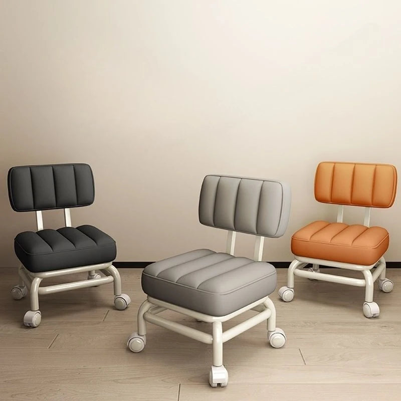 tabouret moderne cuir noir orange rose pivotant roulettes hauteur assise 26cm largeur assise 34cm