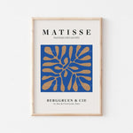 L'image représente une affiche d'art moderne avec le titre "MATISSE Papiers Découpés" et une illustration géométrique composée de formes bleues et dorées.