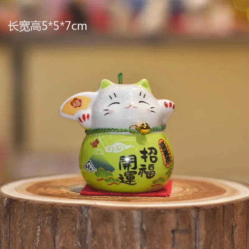 chat souriant tirelire céramique japonaise motifs floraux couleur rouge vert rose bleu jaune