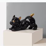 figurine chien bouledogue français noir blanc détails dorés lisse brillante moderne décorative