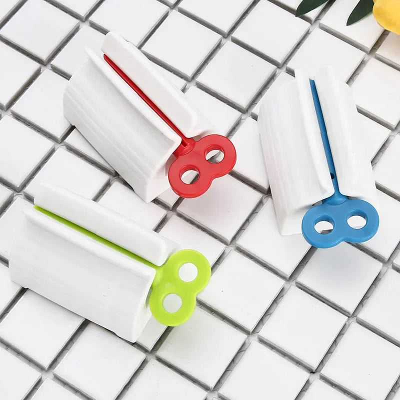 support mural blanc rouge bleu vert tube dentifrice moderne pratique salle bain organisateur anti
