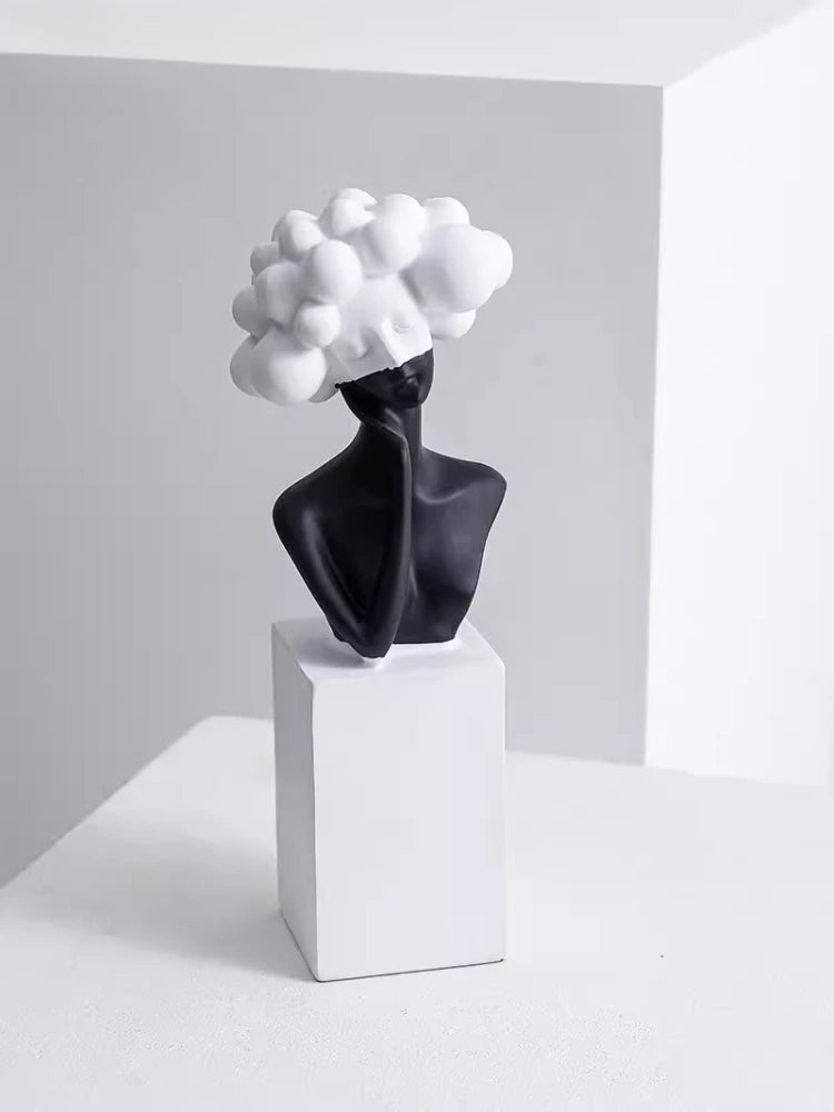statuette décorative buste féminin noir blanc bleu or moderne minimaliste.surface lisse polie.formes arrondies socle