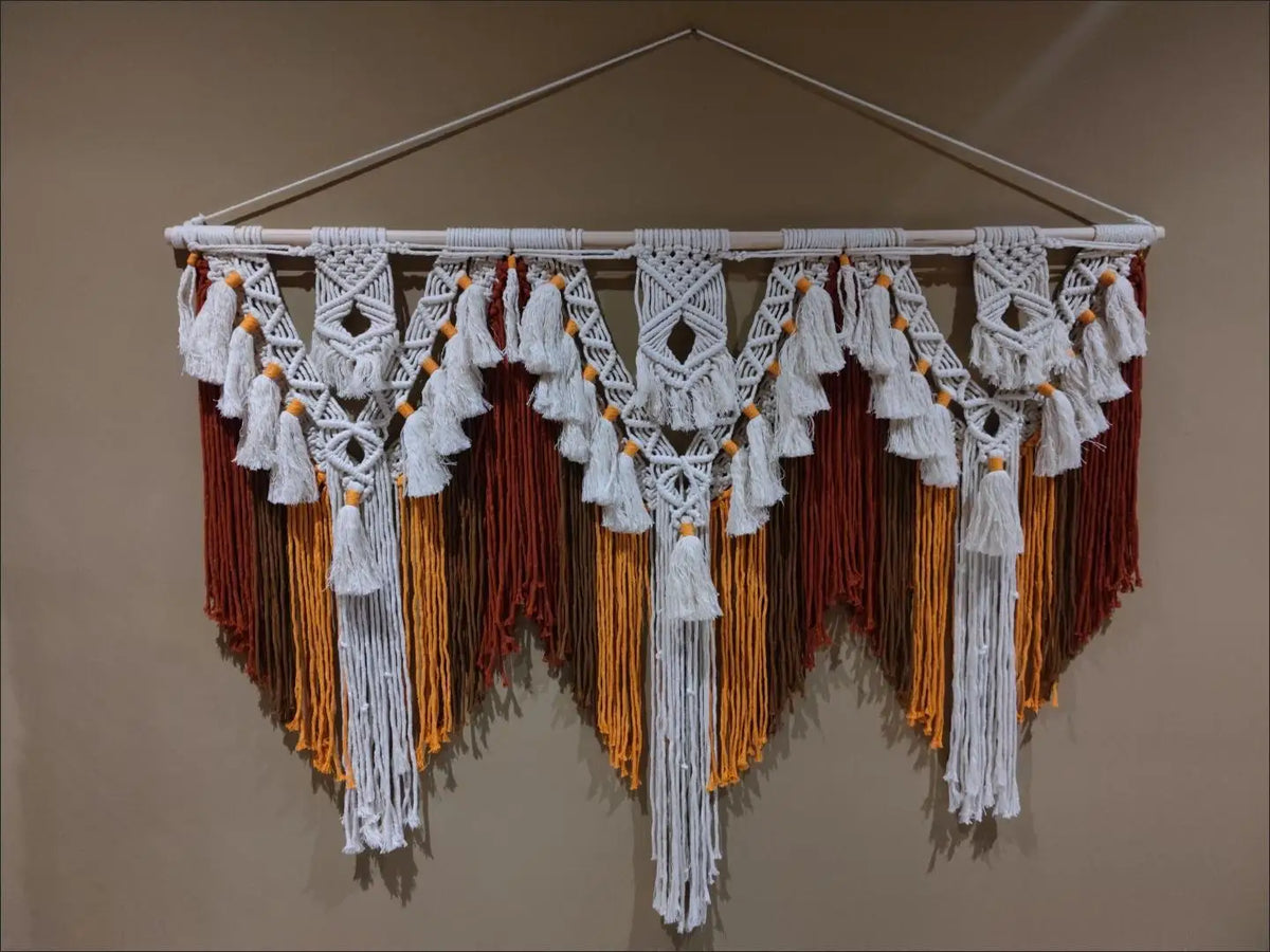 tapisserie macramé boho blanc gris bleu orange motifs géométriques franges crochet chambre