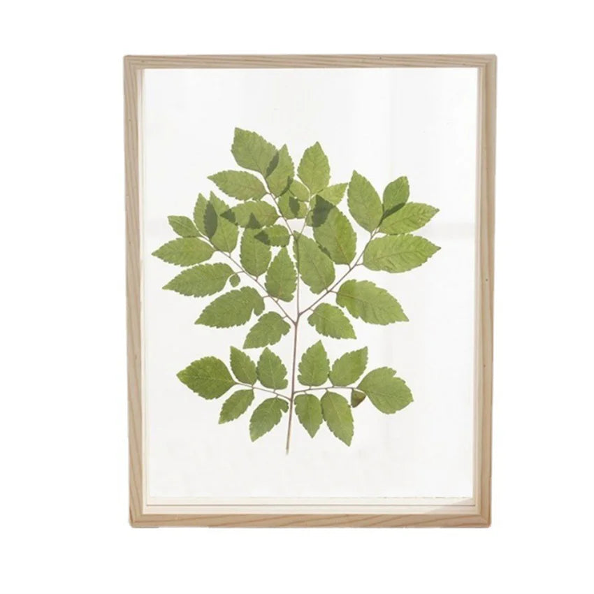 cadre photo bois double face nature morte feuilles brindilles ours peluche minimaliste deco maison