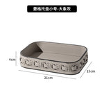 boîte mouchoirs cuir gris plateau diamant moderne flacon parfum bague ruban bougie decoration tranquillite