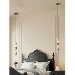 lampe suspendue moderne pierre marbrée salon chambre noire blanche beige éclairage led