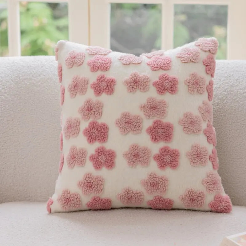 coussin deco boho chic rose blanc motif geometrique franges opaques canape lit decoration intérieure