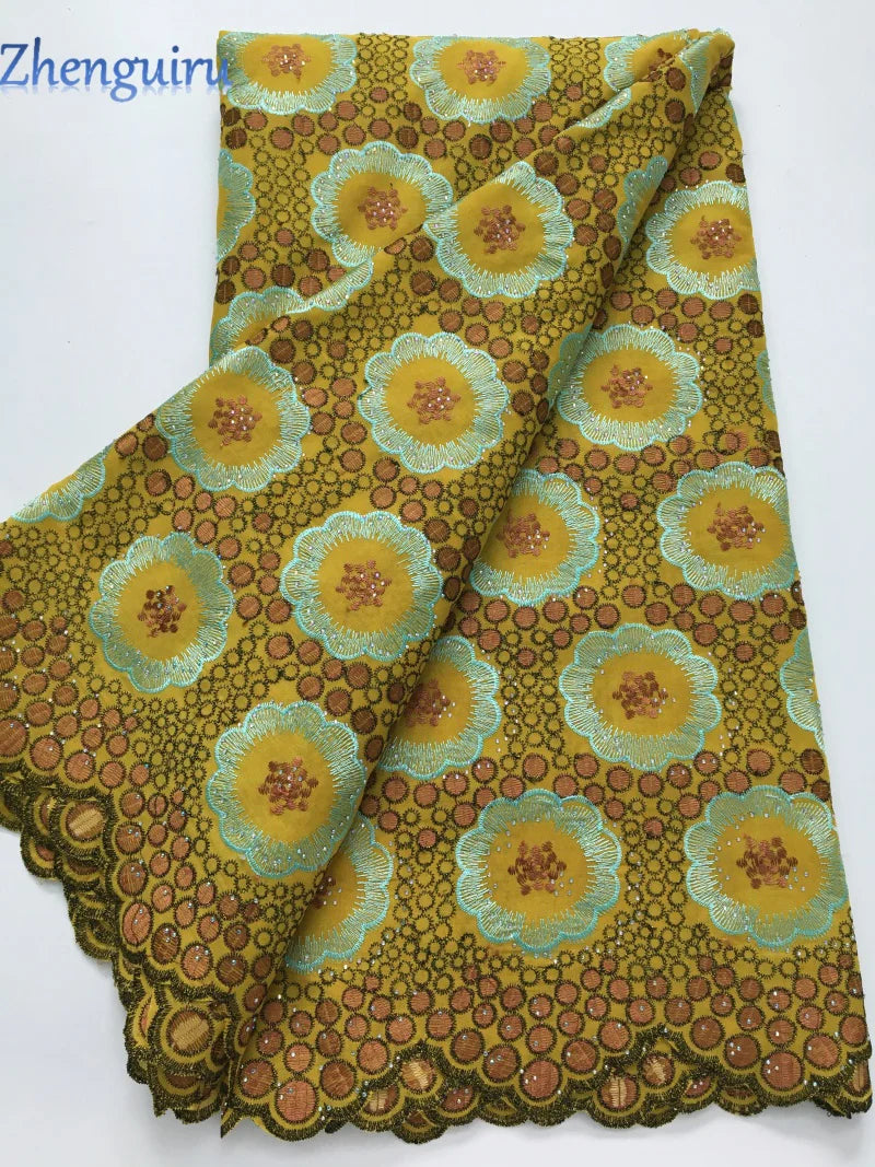 tissu dentelle brodée fleurs concentriques vert olive rose noir opacité occasionnelle africaine