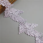 ruban dentelle polyester feuilles stylisées blanc noir vert rose or classique élégant soluble écologique