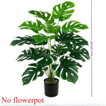plantes artificielles feuilles monstera vertes nervures taches blanches moderne decoration intérieure