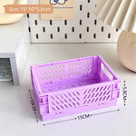 caisse rangement pliable plastique vert beige rose orange violet grille ventilation clips latéraux moderne