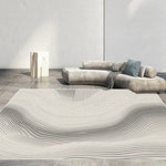 Une pièce design minimaliste avec des formes géométriques et des textures neutres, créant une atmosphère apaisante et épurée.