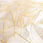 nappe moderne élégante feuilles dorées blanc décoration table serviettes assiettes verres