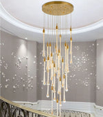 lustre suspension moderne cristal dorées luminaire élégant escalier salon intérieur luxe