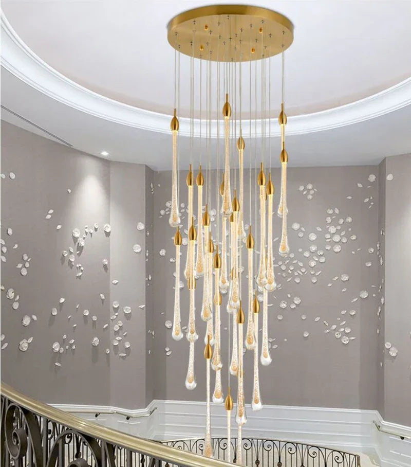 lustre suspension moderne cristal dorées luminaire élégant escalier salon intérieur luxe