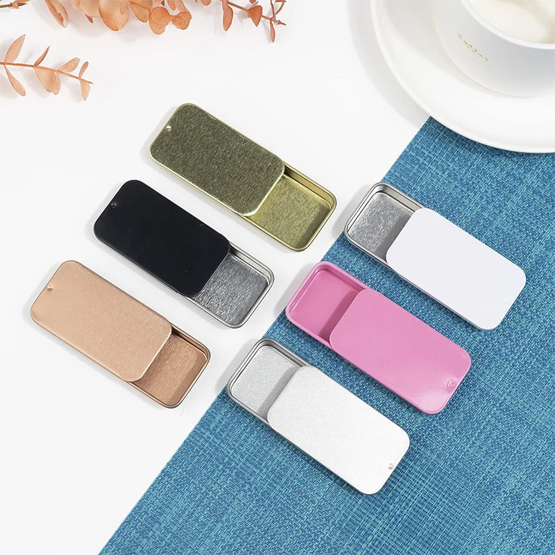 boîtes métalliques or noir rose gris minimalistes opaques petites rangements respectueuses environnement