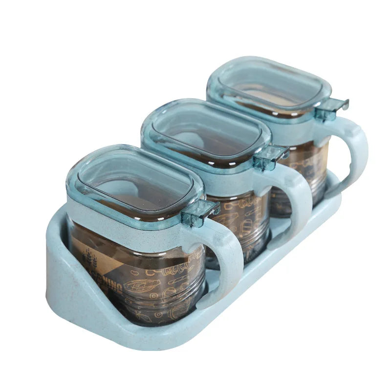 boîtes épices transparentes verre moderne rose verte bleu poignées couteau service herbes condiments cuisine