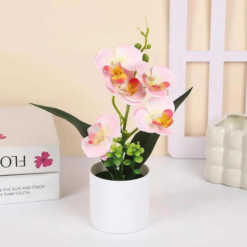décoration intérieure orchidées artificielles pots blancs fleurs simples feuilles vertes moderne