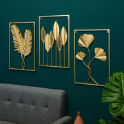 décoration murale feuilles stylisées or vert foncé minimaliste moderne ajourée botanique chambre salon